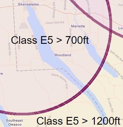 Sectional chart showing Class E5 airspace floors of 700 ft and 1200 ft over the lake